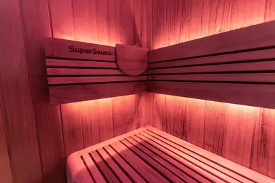 a wooden bench with a sign on it at Blvck Spa in Brussels