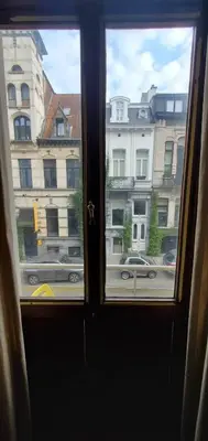 a view of a city street from a window at Historic Brussels in Brussels