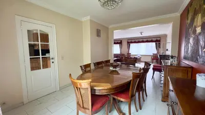 a dining room with a wooden table and chairs at House with 5 bedrooms near Brussels in Wemmel