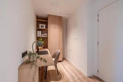 a dining room with a table and chairs in a room at Stay at Brussels in Brussels