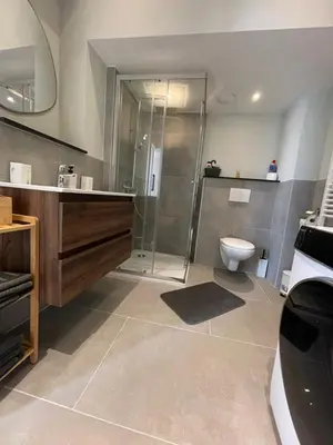 a bathroom with a shower and a toilet at Midi Station 2 in Brussels