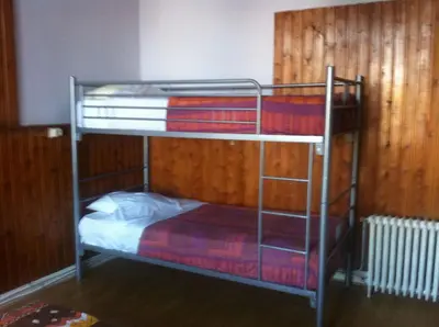 a couple of bunk beds in a room at The82 Hostel Louise in Brussels