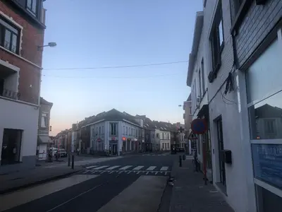 an empty street in a city with buildings at Holiday Small Shared Room in Gent in Ghent