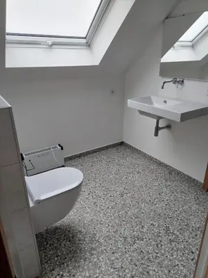 a bathroom with a toilet and a sink at Krie 2 by Luttelkolen in Tielt