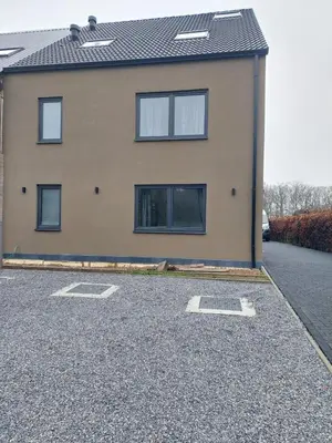 a house with a parking lot in front of it at Krie 2 by Luttelkolen in Tielt