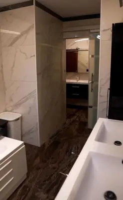a bathroom with a white sink and a counter at Beautiful 4 bedroom Villa close to Antwerp in Zwijndrecht