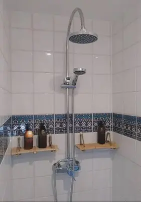 a bathroom with a shower and a shower at The Bohemian House Melle in Melle