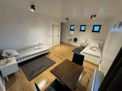 an overhead view of a living room with a table at Stay Here in Erpe-Mere