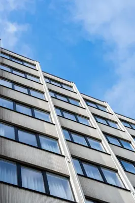 a facade of a building with a ladder at Via Antwerp in Antwerp