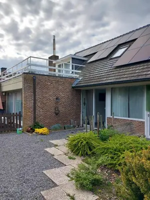 a house with a roof with solar panels on it at Meerdaal in Oud-Heverlee