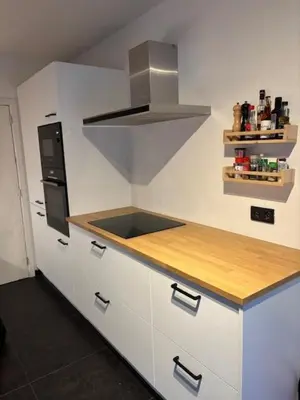 a kitchen with a sink and a stove at Lovely house next to Tomorrowland in Boom