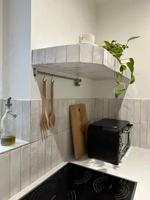 a kitchen with a toaster oven and a stove at New studio centre in Brussels