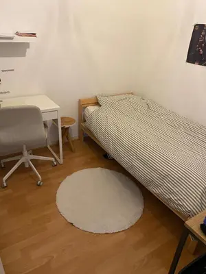 a bedroom with two beds and a desk and a chair at Perfect for Tomorrowland in Edegem