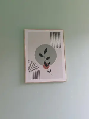 a picture of a plant on a wall at Cosy -confort appartment in Antwerp