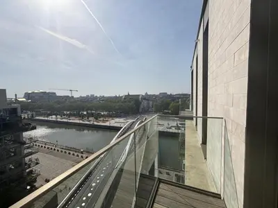 a view of a river from a building at Splendid Penthouse in City Center with Water View in Brussels