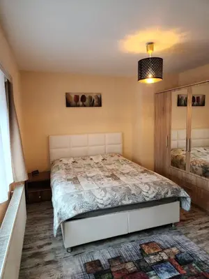 a bedroom with a bed in a room at New build flat - Walking distance from Brussels Airport in Zaventem