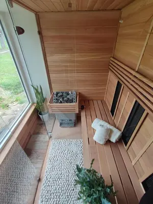 an inside view of a sauna with a window at Naturedegrez in Grez-Doiceau