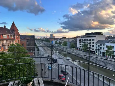 a view of a city with cars on a street at Sleep & Explore Brussels in Brussels