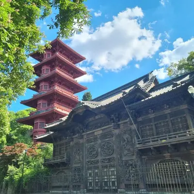 a pagoda in front of a building at Chinese Pavilion Park - Magnificent Apartment Brussels in Brussels