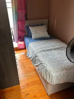 a small bedroom with a bed and a window at Dream Home For Tomorrowland in Boom