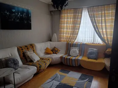 a living room with a white couch and a window at Dream Home For Tomorrowland in Boom
