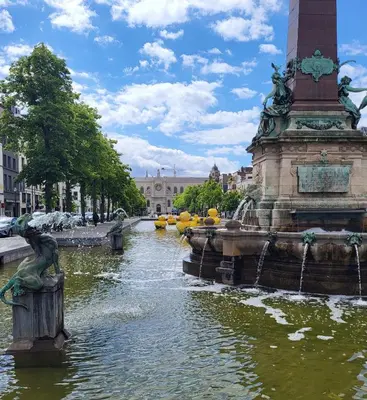 a fountain in the middle of a canal at Studio Saintes-Catherine in Brussels