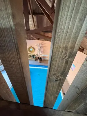 an overhead view of a blue tub in a ceiling at Sensi Waters in Duffel