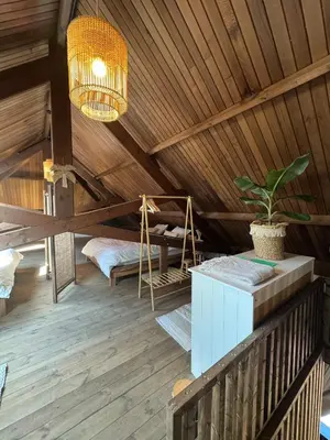a room with a hammock in a wooden ceiling at Sensi Waters in Duffel