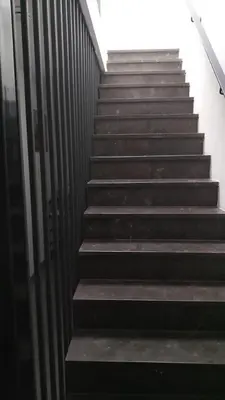 a set of stairs leading up to a building at Apartment Boom 200m from centrm in Boom
