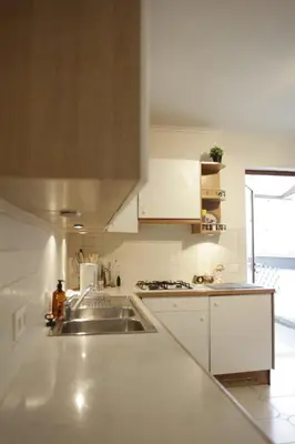 a kitchen with a sink and a counter top at Sunny Stay & Chill in Brussels