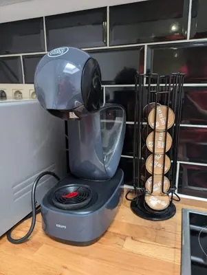 a black mixer sitting on a wooden counter at Full apartment near Brussels and Zaventem in Vilvoorde