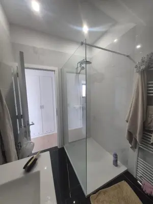 a bathroom with a shower with a glass door at Genius BNB Buyl 2BR Terrace Near City Center Brussels in Brussels