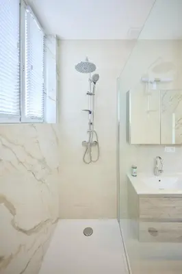 a bathroom with a shower and a sink at Louise City Center in Brussels