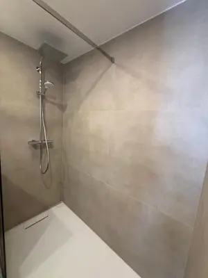 a bathroom with a shower with a shower at Luxury 2BR Apartment Heart of Mechelen in Mechelen