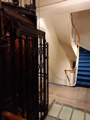 a room with a staircase and a stair case at Panorama Vue Penthouse in Brussels