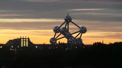 a statue of a group of people in a net at Panorama Vue Penthouse in Brussels