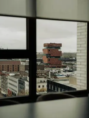 a view of a city from a window at Sunset Penthouse Antwerp in Antwerp