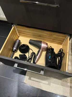 a drawer with a knife and other items in it at Comfortable Apartment in Brussels, 35 m², 3 Persons in Brussels