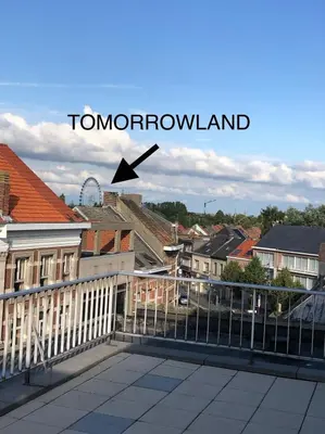 a view of a city from a balcony with the words tomorrowland at TML 500m - Luxury Penthouse with 2 Balconies in Boom