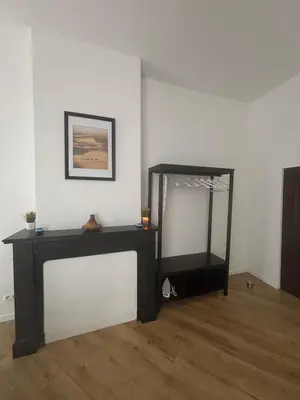 a room with a mirror and a dressing table at Studio Lilia in Brussels