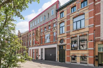 an apartment building on a city street at Rooftop appartement in Sint-Niklaas