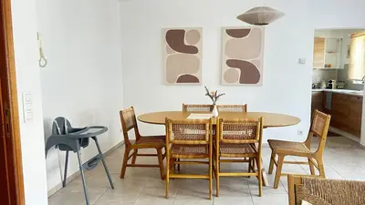 a dining room with a table and chairs at Apartment for 6 people - near Brussels & Airport in Wezembeek-Oppem