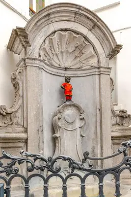 a person standing on top of a building at Luxury home at Grand Place & Manneken Pis in Brussels