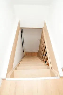 a staircase in a house with wooden floors at Chic & Modern 1BR & 1LR Apt, 12 Min Walk to Rabot in Ghent