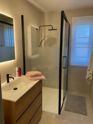 a bathroom with a sink and a shower at Casa Duffla in Duffel