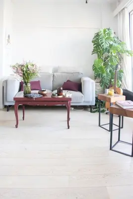 a living room with a couch and a coffee table at Cozy apartment - Super central in Brussels