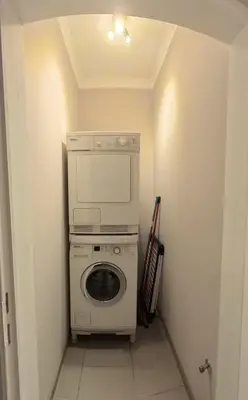 a washer and dryer in a small room at Aurelia in Zemst