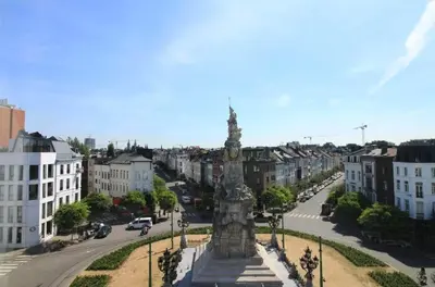 a large monument in the middle of a city at Stylish Apartment in 't Zuid in Antwerp