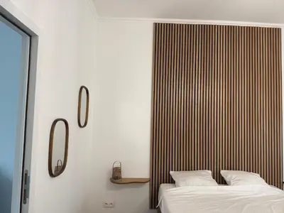 two beds sitting next to each other in a bedroom at Oasis Apartament in Brussels