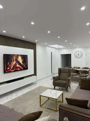a living room with a fireplace in the wall at House for TOMMORLAND 700 m in Boom 2850 in Boom
